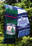 Scarf with Portland and HFX Wanderers logos hanging on a tree